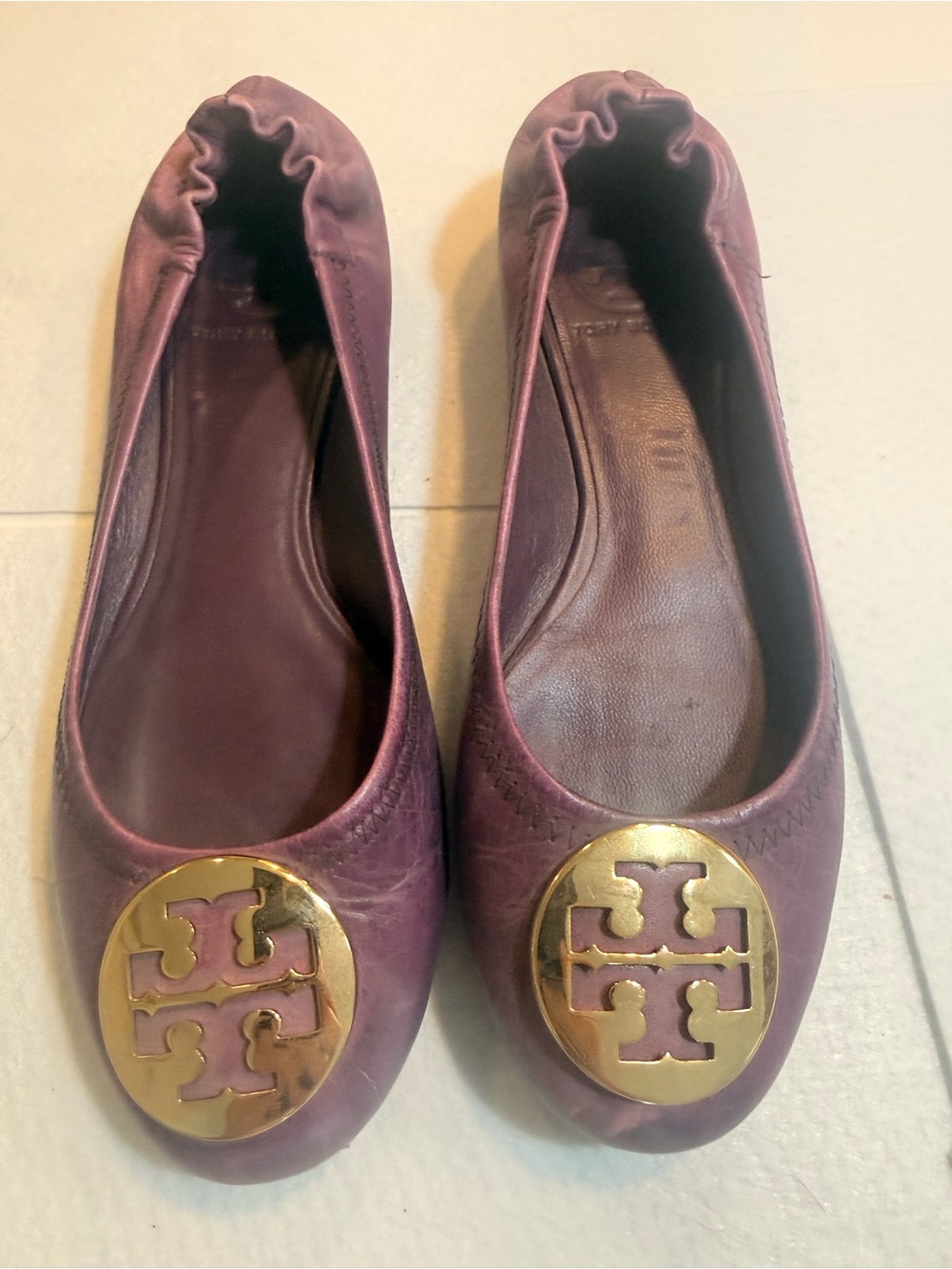 Tory Burch Plum Leather Logo Ballet Flats with Gold Medallions